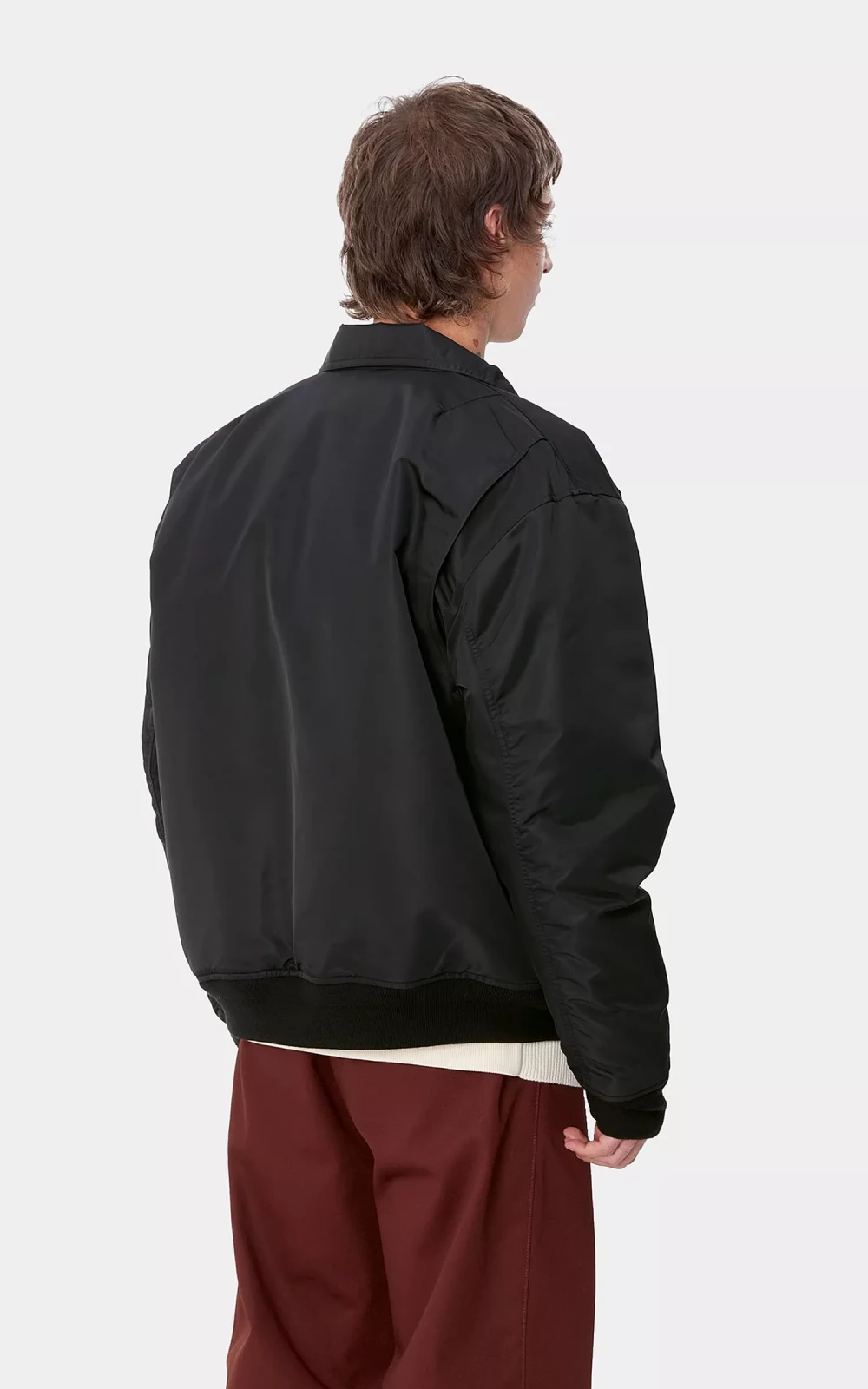 Carhartt WIP Olten Bomber Jacket Nylon Black/Turmeric | Cultizm Carhartt WIP Olten Bomber Jacket Nylon Black/Turmeric | Cultizm